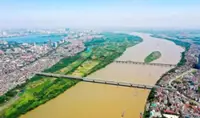Hanoi seeks to woo Red River residents by doubling compensation; aims to expedite land clearance for major redevelopment plan