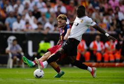 Soccer-Fermin shines for Barcelona in thumping win at Valencia
