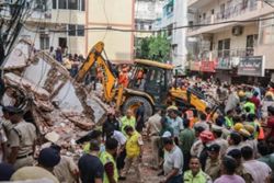 Three killed, others trapped in India building collapse