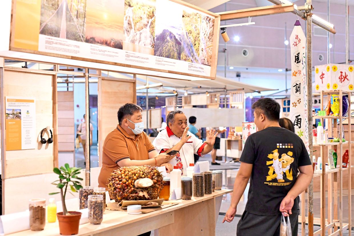 Visitors checking out products from new villages during WOW! Central & Southern Region New Village Expo in Johor.
