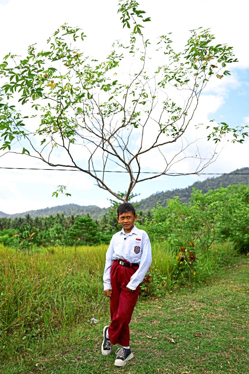 Nine-year-old Revan Ardianto during an interview at an elementary school in Sandalan village. — Reuters