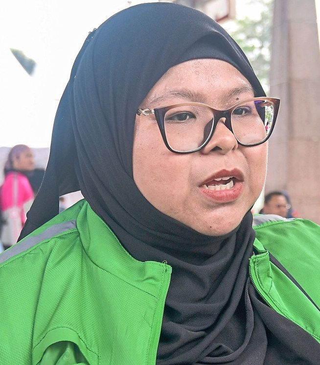 Nurasma hopes for covered parking bays to keep their motorcycles out of rain and hot sun.