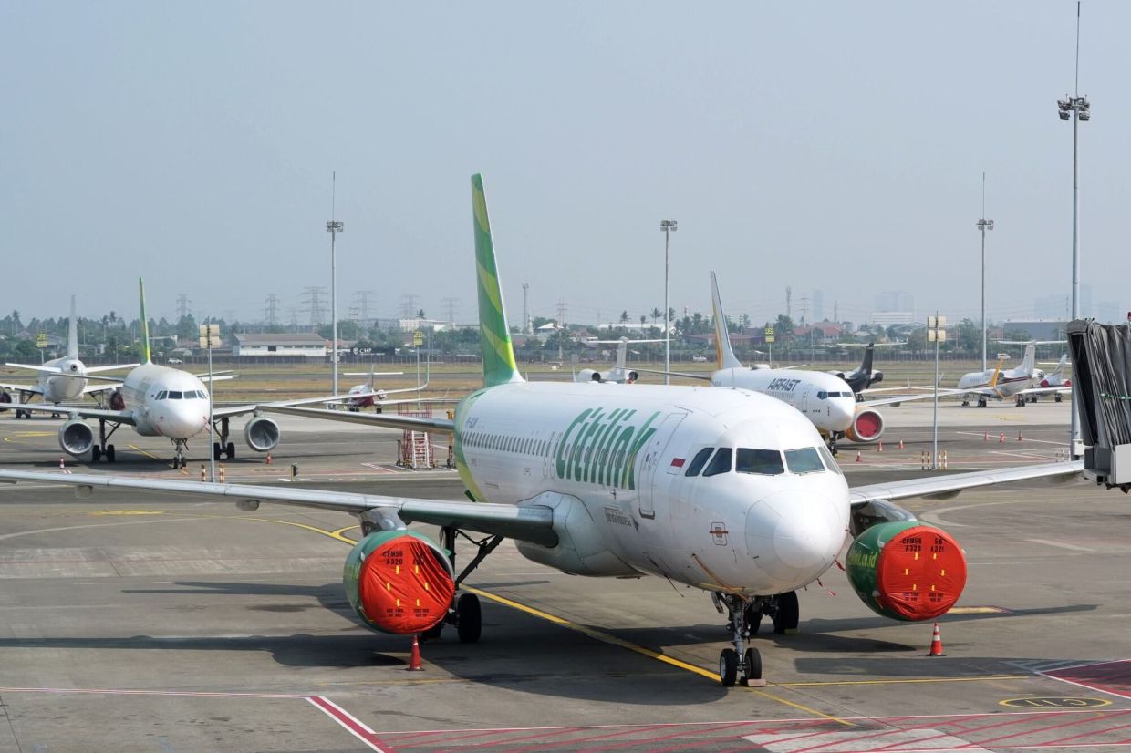 Jakarta airport and others reopen after volcanic ash crisis