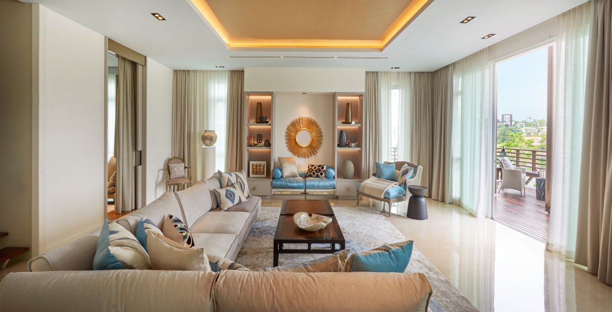 Living areas in Emerald Bay homes are designed to capture abundant natural light and cross ventilation, seamlessly connecting indoor comfort with private outdoor terraces.