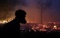 Nearly 900 hectares land, forest fires still burning in Indonesia