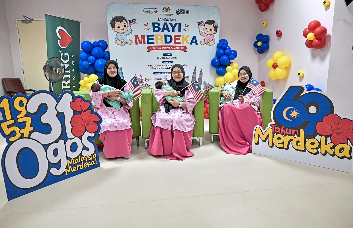 (From left) Nor Asyikin Mat Yeng, Siti Zulaika M. Jasni and Rajeah Amud proudly cradling their newborns, born on Aug 31, at Hospital Tunku Azizah in Kuala Lumpur.
