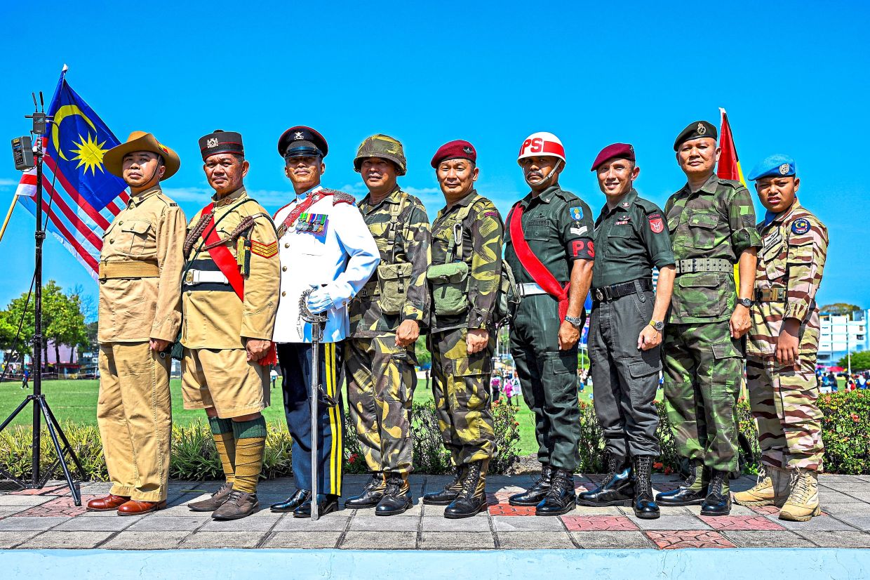 Persatuan Peminat Sejarah Pahlawan members showing military uniforms from various eras of the country’s history, during the parade for Negri Sembilan state-level National Day celebrations at Dataran Majlis Bandaraya Seremban.