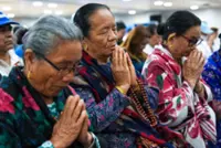 Hong Kong’s Nepalis gather for prayers on 13th day of flood mourning