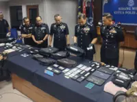 Police bust two gangs over 17 car break-ins at Desaru resorts