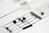 Suno releases new AI music models in partnership with Warner Music, BMG