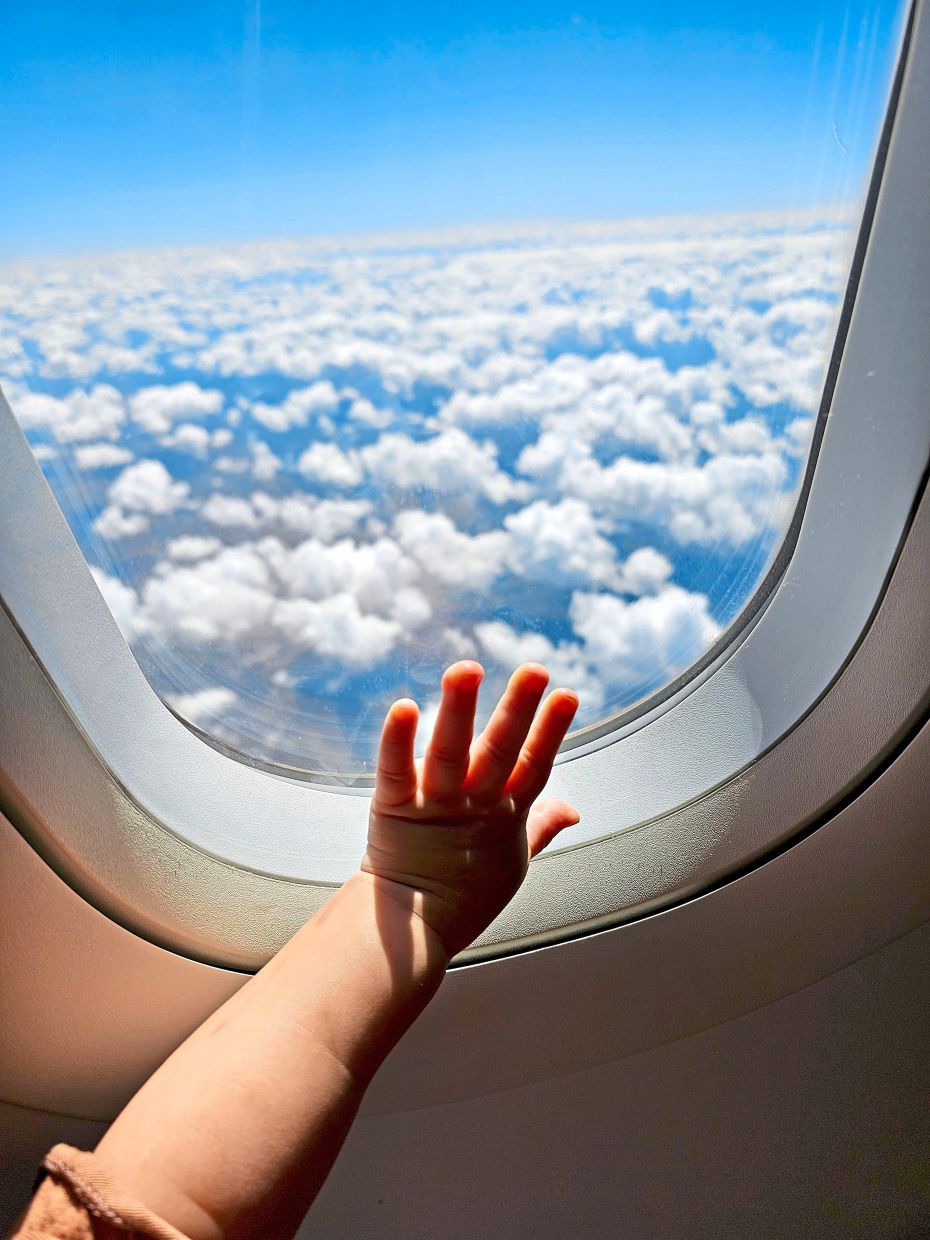 While flying with kids can be intimidating, Thompson says the biggest thing to think about is safety, followed by comfort. Photo: Pexels