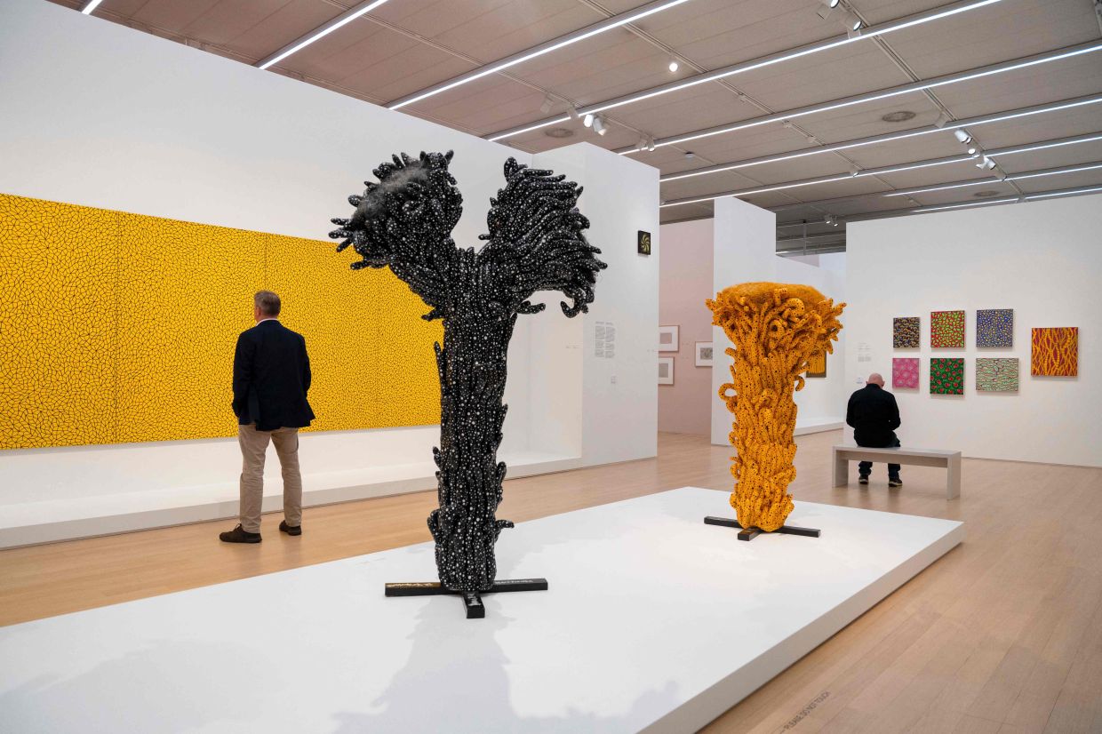 The exhibition at Amsterdam's Stedelijk Museum features dozens of installations, ceramics, etchings and drawings from Kusama. Photo: AFP