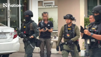 Son’s pleas end 18-hour standoff with Thai police officer who allegedly shot and killed wife in kindergarten