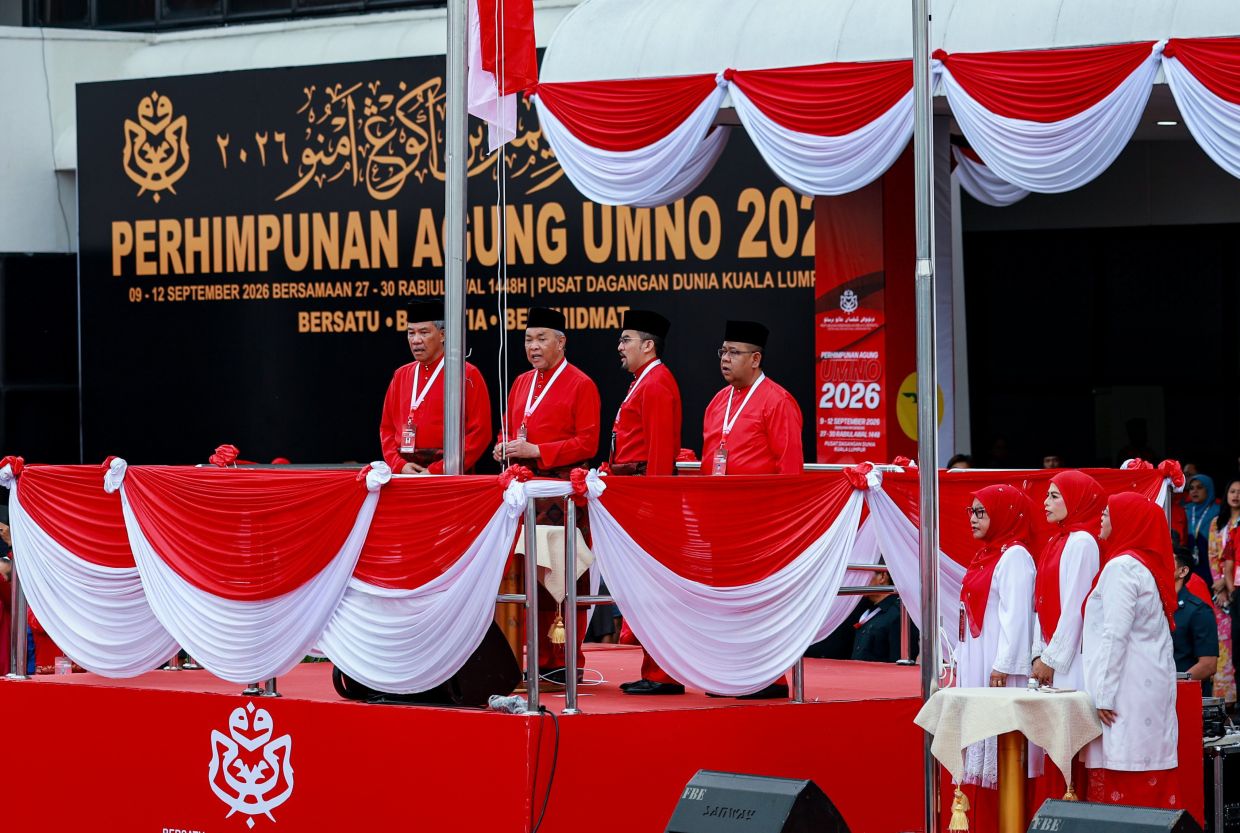 Zahid leads flag-raising ceremony at Umno AGM