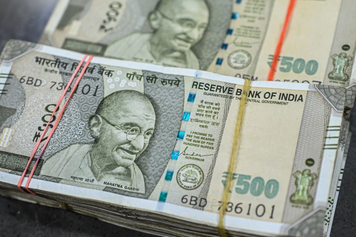 Indian central bank likely intervenes to defend rupee as oil prices climb, traders say