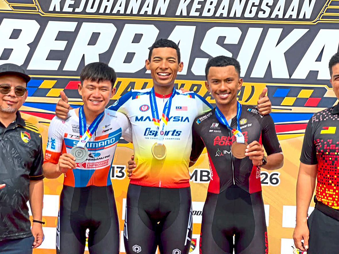 Seventh heaven for Aiman as he defends time trial title
