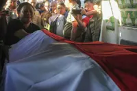Police hunt Papuan separatists after three civil servants killed in shooting