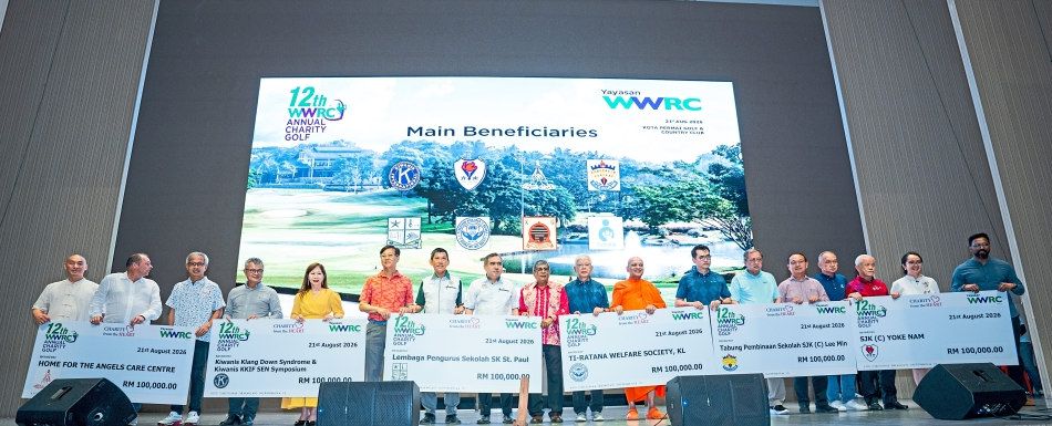 A group photo of representatives of the beneficiary organisations alongside the organisers, with Teoh (sixth from left) and Loke (eighth from left).