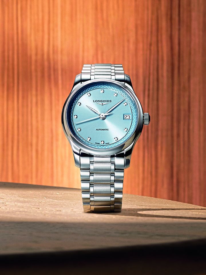 A Longines Master Collection three-hand model featuring a sunray frosted blue dial set with diamond indexes in rounded chatons.