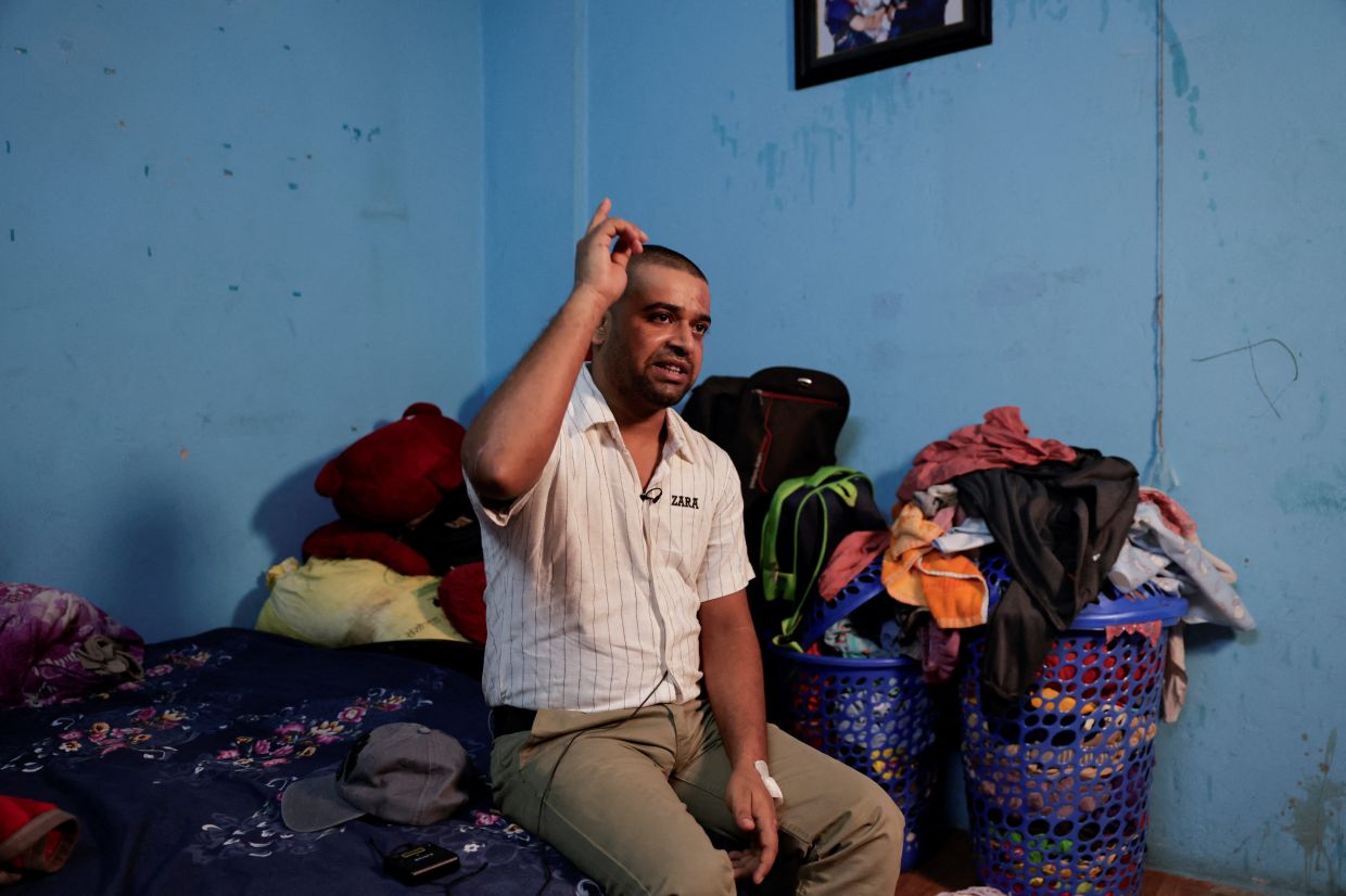 Sanjay Sah, a survivor pulled out alive after spending nine days trapped in a hydropower station tunnel following flash floods and a mudslide, speaks with a member of the media at his sister’s rented apartment after being discharged from the army hospital in Kathmandu, Nepal, Sept 11, 2026. - Photo: Reuters