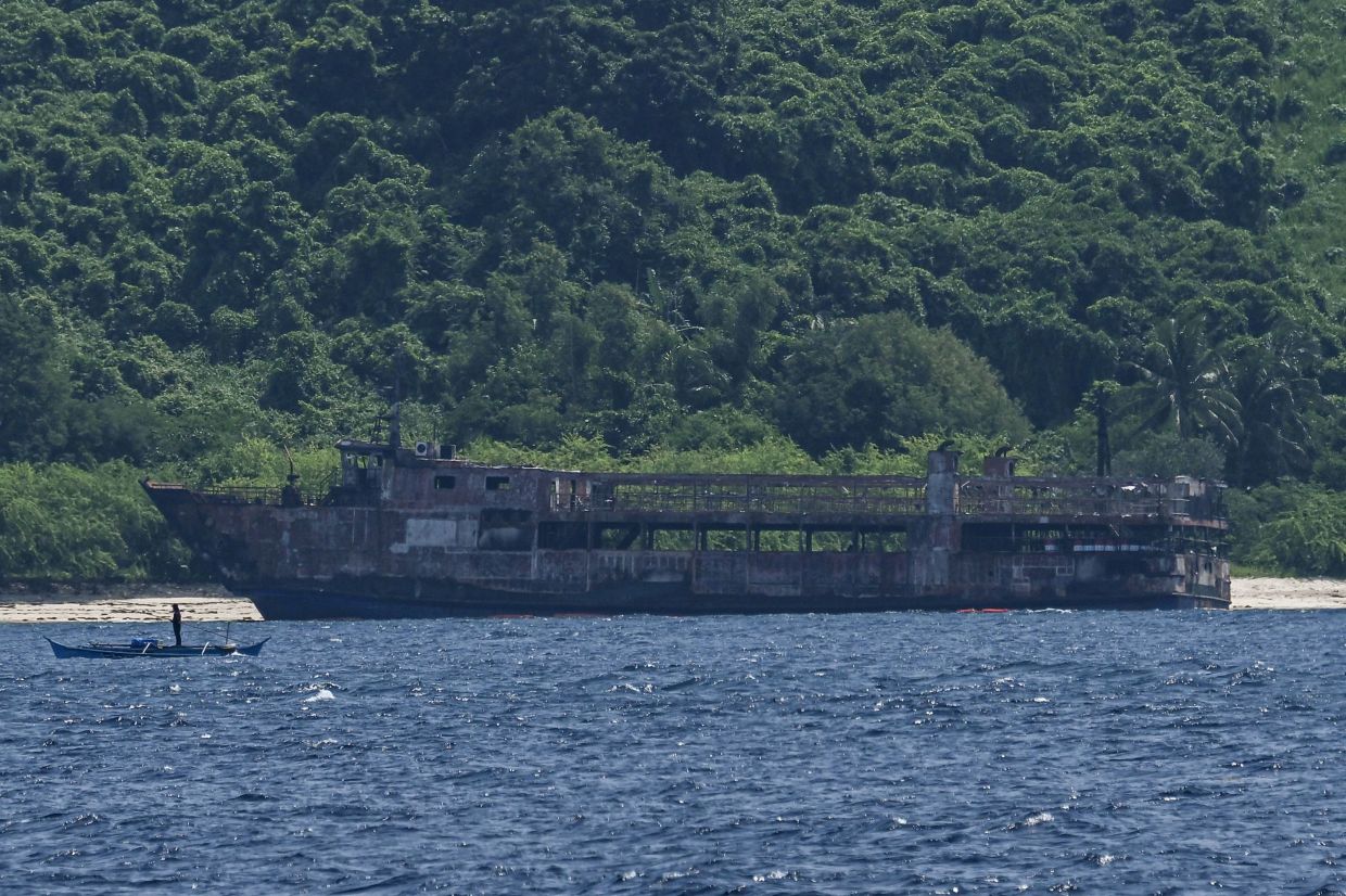 The burnt-out wreckage of a ferry that caught fire is seen in Coron, Palawan on September 13, 2026. The death toll from a Philippine ferry fire jumped to 76 on September 12 after the coast guard confirmed the discovery of 41 more bodies aboard the burnt-out vessel. - Photo: AFP