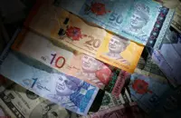 Ringgit expected to trade in tight range against US dollar next week