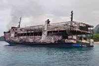 Philippine ferry fire victims may take months to identify, authorities say; death toll now at 76