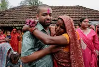 Nepal tunnel survivor finds solace in village homecoming