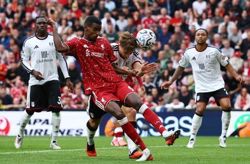 Soccer-Liverpool and Chelsea held, wins for Forest and Ipswich