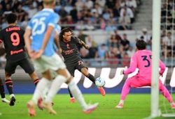 Soccer-Milan substitutes come to the rescue as they draw at Lazio