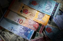Ringgit expected to trade in tight range against US dollar next week