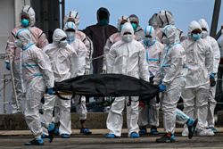 Philippine rescuers pull more victims from charred ferry
