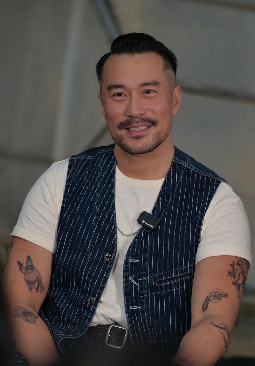 Chang sports multiple tattoos for his role as a gang member in the film.