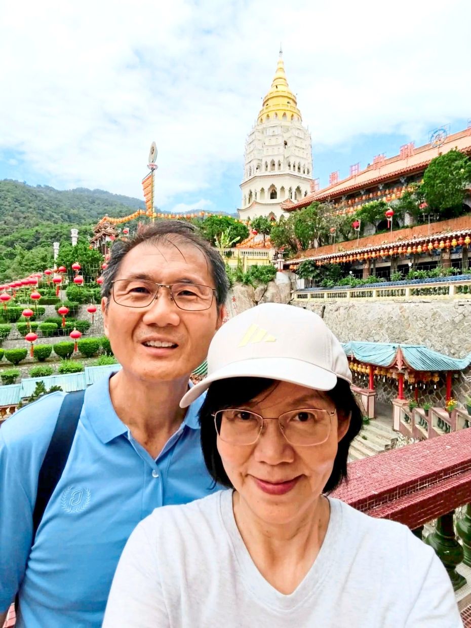 The writer and her husband at Kek Lok Si.