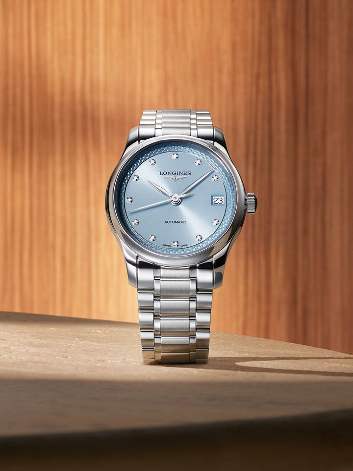 A Longines Master Collection three-hand model featuring a sunray frosted blue dial set with diamond indexes in rounded chatons.