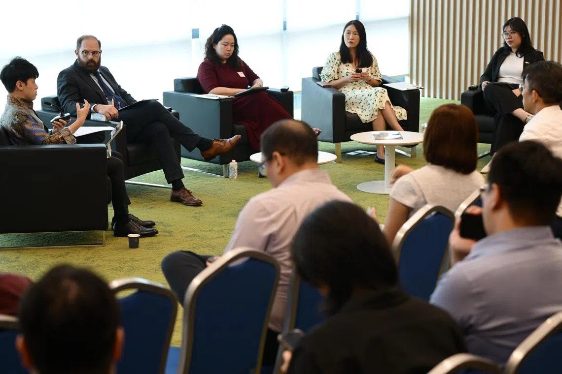 (From left) Moderator Josh Lee Kok Thong, SMU’s law school adjunct faculty member and Media Literacy Council member; SMU Centre for Digital Law director Jason Grant Allen; MDDI information policy division director Angela Tan; SMU vice-president of partnerships and engagement and professor of communication and technology Lim Sun Sun; and YouthTechSG’s YouthTech Institute head of advocacy Zoe Toh.in a panel discussion on Sept 14. -- ST PHOTO: NG SOR LUAN