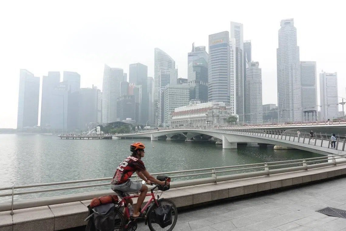 Hazy conditions over the Central Business District in Singapore at 11.30am on Monday, Sept 14, 2026. The PSI in central Singapore rises to 136; air quality in south, east and west also hits unhealthy level. -- ST PHOTO: JOYCE FANG/Asia News Network