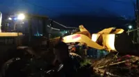 One dead, 13 injured as landslides hit Indonesia's central Aceh