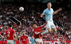 Soccer-Haaland strike gives Man City 1-0 win over Man United after Foden sent off