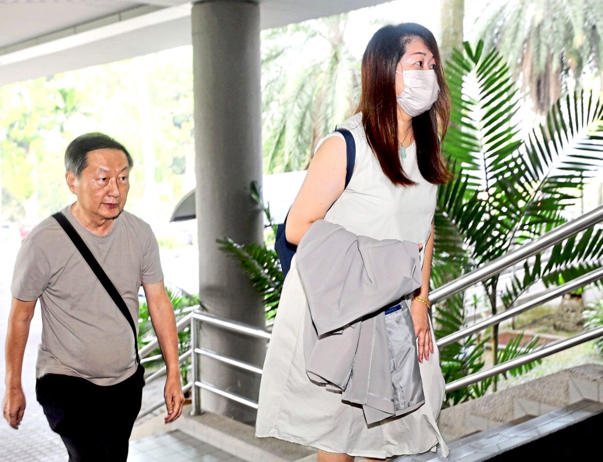 Year-long wait: The parents of the murdered teen appearing at the Shah Alam Court.