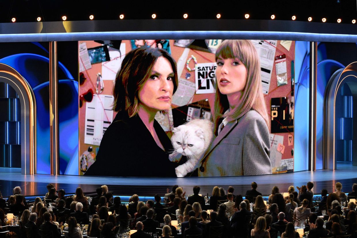 Mariska Hargitay and Taylor Swift and her cat Olivia Benson appear on screen during the 78th Primetime Emmy Awards. Photo: AFP