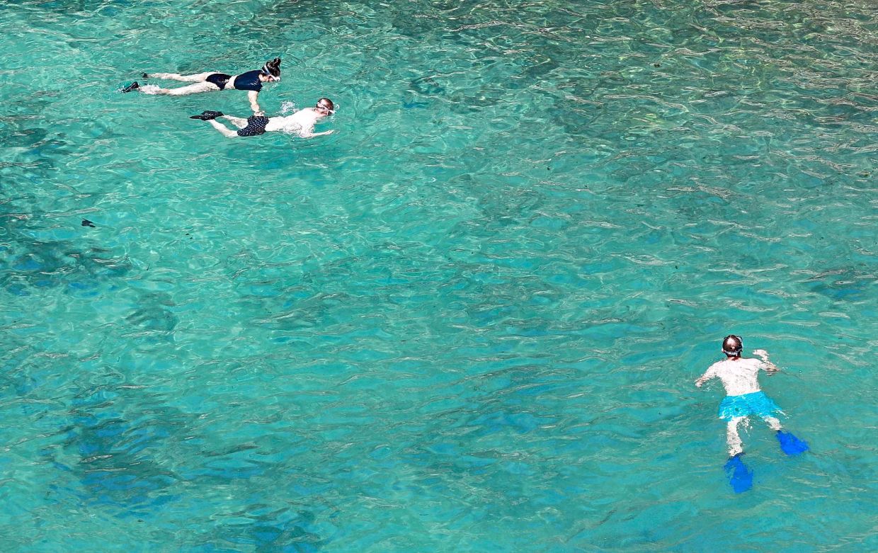 Forget the idea that cruises are for older people – snorkelling in these clear waters, it felt like a perfect trip for a father and son, according to the writer. — CLARA MARGAIS/dpa