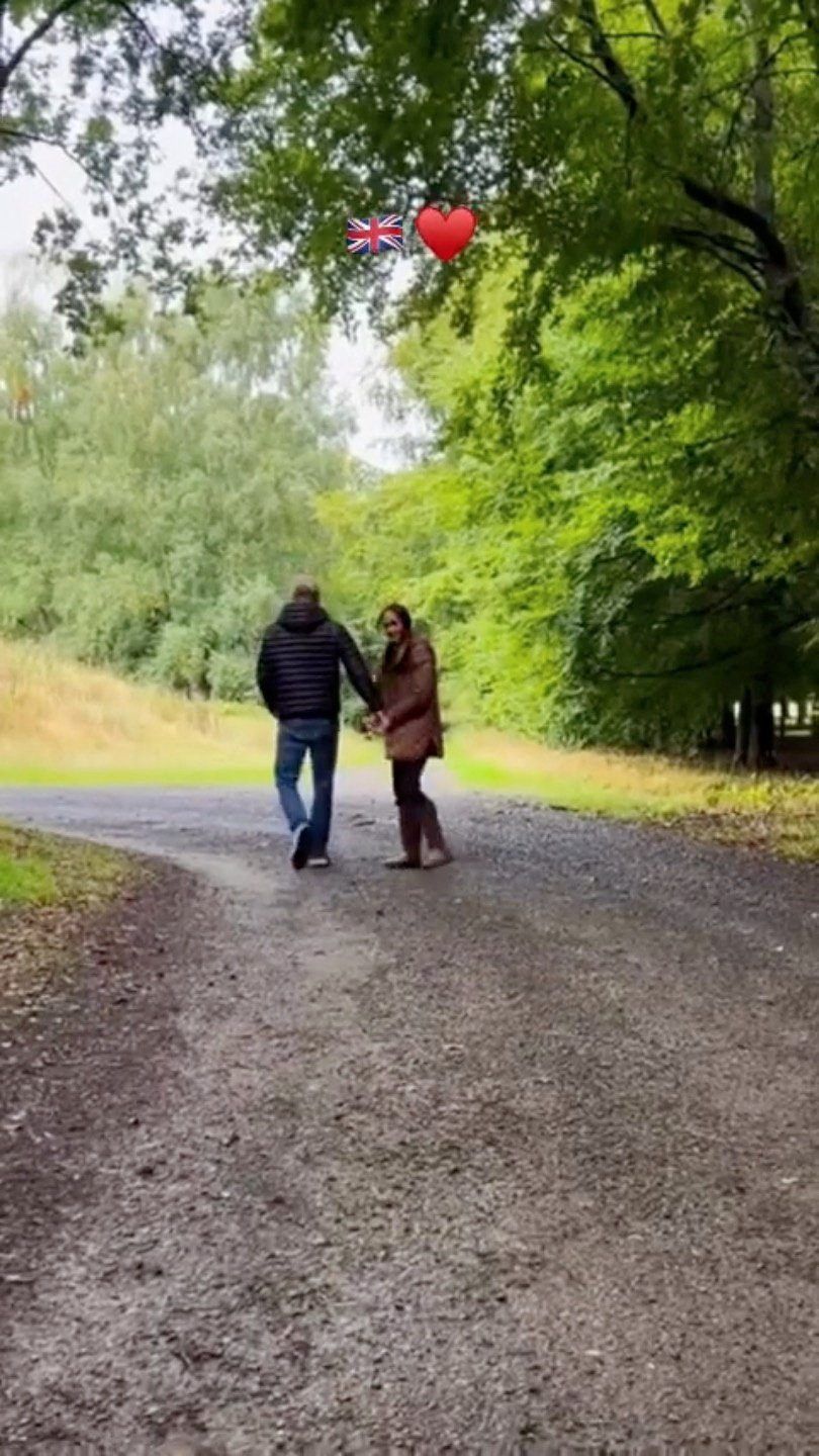 Britain's Prince Harry and his wife Meghan, the Duke and Duchess of Sussex, walk at an unknown location in this still image taken from video released September 13, 2026. Meghan, Duchess of Sussex via Instagram/Handout via Reuters