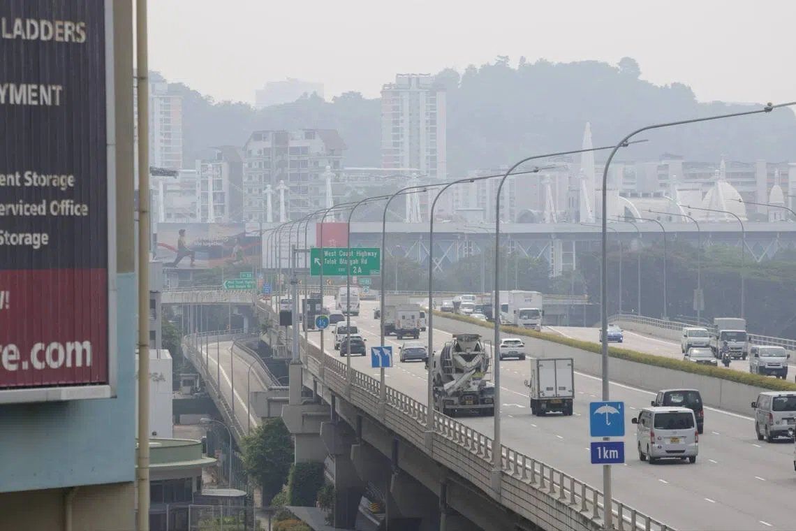 Hazy conditions seen from Tanjong Pagar Distripark towards Bukit Purmei and Mount Faber at 3.02pm on Sept 15. - Photo: ST