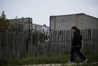 Russians make the best of a struggling economy before vote