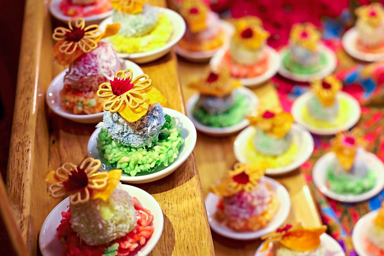 Look out for Perak’s Onde Onde with Inang Inang, and (below) Penang’s Nyonya Durian Bubur Cha-Cha served in white chocolate cups.