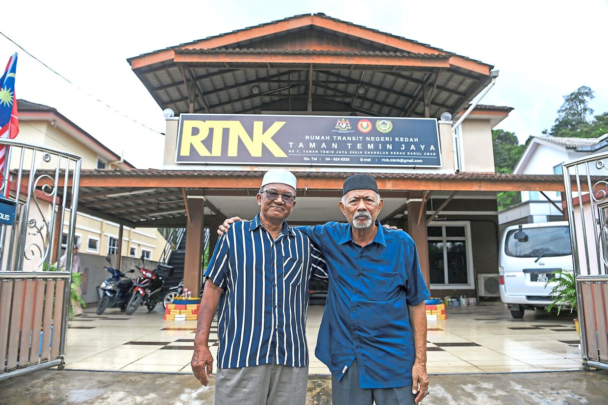 Shoberi (left) and Fadilah are active in charitable and volunteer work.
