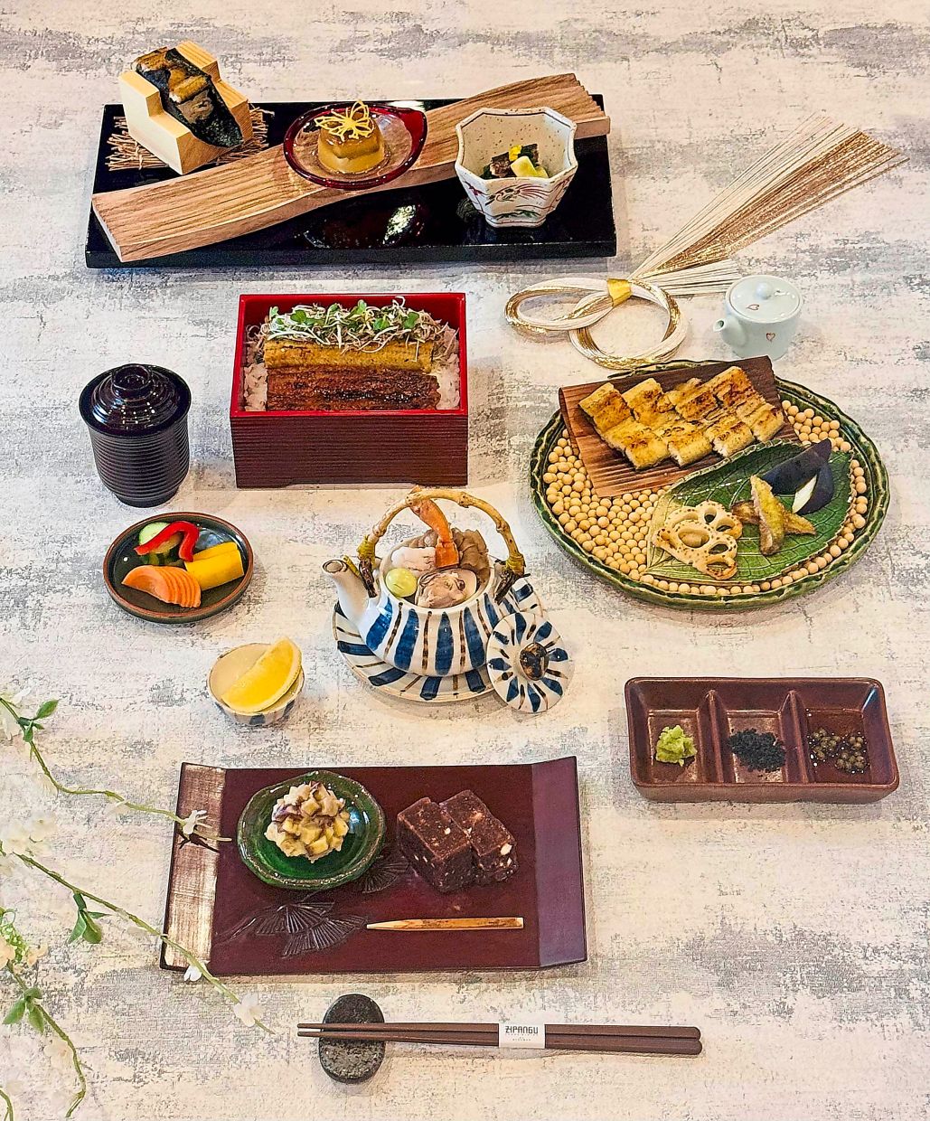 The Koihei unagi promotion presents a carefully crafted menu that explores the versatility of grilled eel through traditional Japanese techniques.