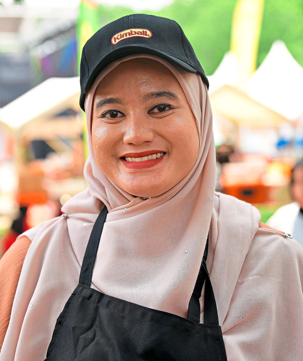 Nur Hazwani cooks daily for her school-going children.