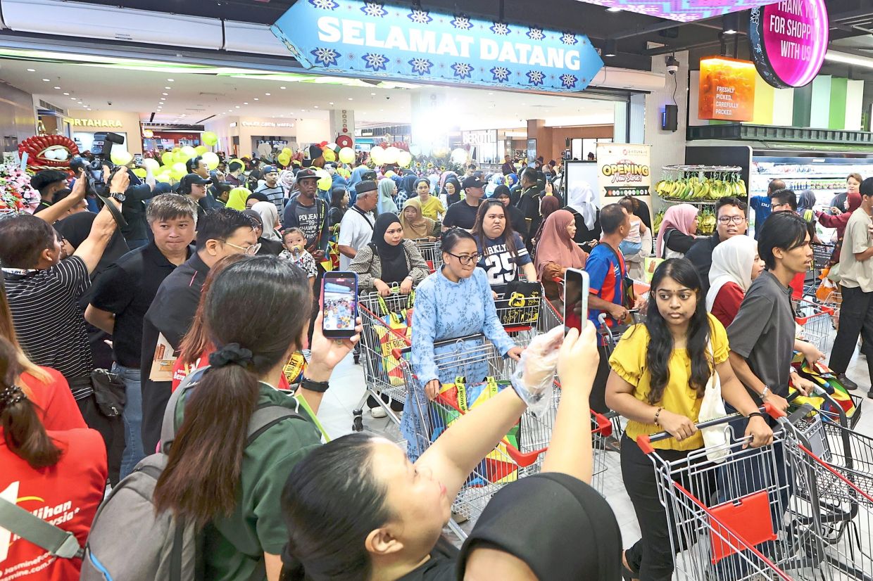 Crowds on the opening day at the ST Rosyam Mart outlet.